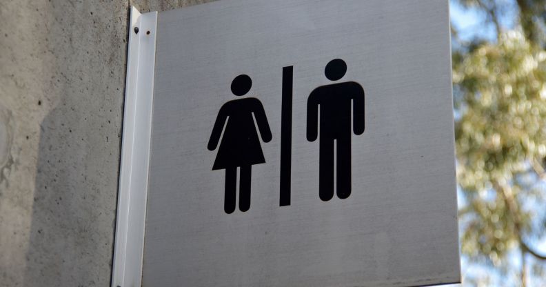 A public toilets sign.