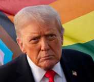Donald Trump stands in front of Progress Pride flag.