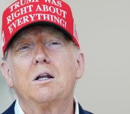 WASHINGTON, DC - AUGUST 22: U.S. President Donald Trump speaks to the media wearing a hat that reads, "Trump Was Right About Everything!," during a visit to The People's House: A White House Experience August 22, 2025 in Washington, DC. Trump spoke on a variety of issues including stating he did not know of the FBI raid currently happening on former national security adviser John Bolton's home, and saying he learned of it by seeing the news on television. (Photo by Kevin Dietsch/Getty Images)