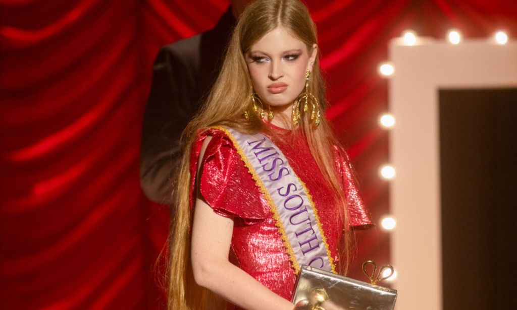 Vivian Jenna Wilson in a red gown and sash for Alexis Bittar's Miss USA 1991.