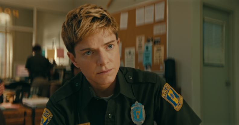 Mae Martin in a police uniform