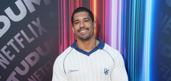 Anthony Bowens attends Netflix's Tudum LIVE 2025. He's wearing a blue and white sports shirt