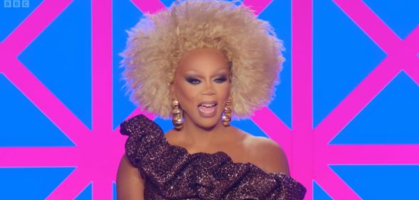 RuPaul on the Drag Race UK judging panel laughing.