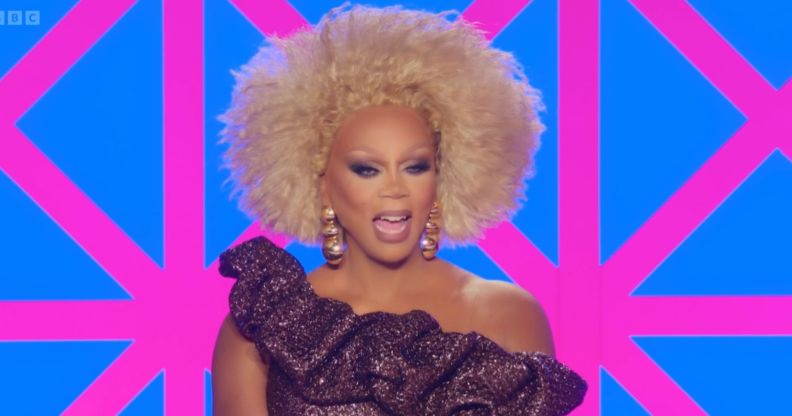 RuPaul on the Drag Race UK judging panel laughing.