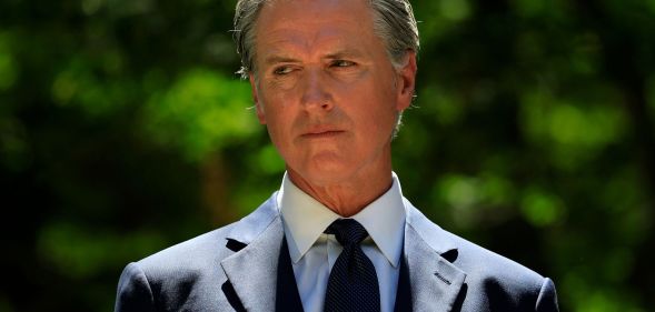 Gavin Newsom, pictured in a suit and tie.