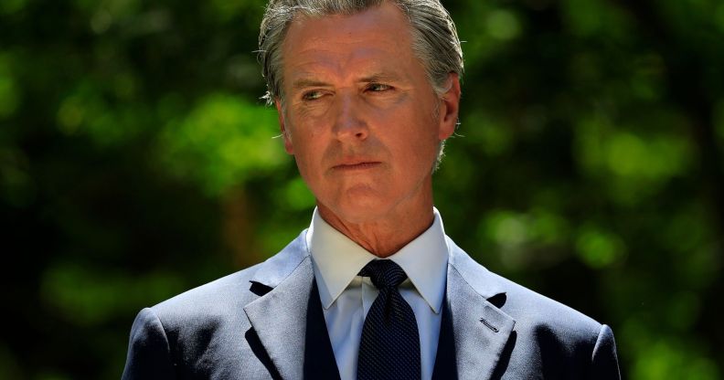 Gavin Newsom, pictured in a suit and tie.
