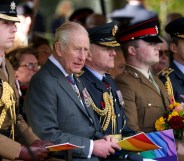 ALREWAS, STAFFORDSHIRE - OCTOBER 27: King Charles III (2nd L) during the dedication ceremony for a new memorial to the Armed Forces LGBT+ community at Founders Room National Memorial Arboretum on October 27, 2025 in Alrewas, Staffordshire. The memorial, named "An Opened Letter" is the first to be dedicated to members of the LGBT+ community in the armed forces. Until 2000, it was illegal for members of the British Armed Forces to be openly gay. The memorial is dedicated to those who suffered under this law as well as those currently serving in the military. (Photo by Phil Noble - WPA Pool/Getty Images)