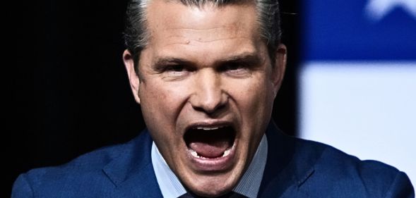 Pete Hegseth, pictured with his mouth open.