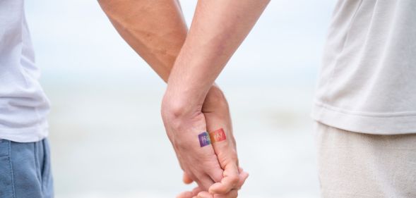 A couple holding hands.