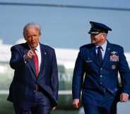 US president Donald Trump and US Air Force Col. Christopher M. Robinson.