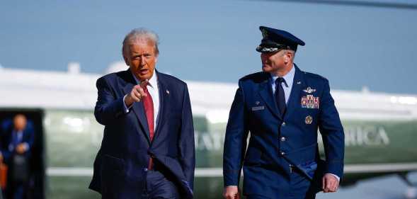 US president Donald Trump and US Air Force Col. Christopher M. Robinson.