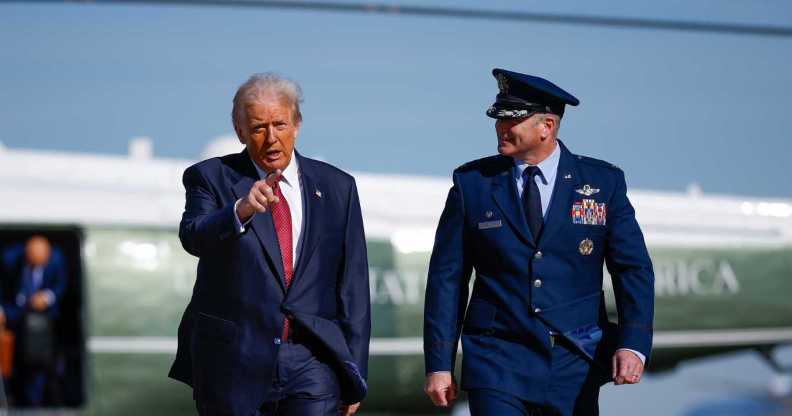 US president Donald Trump and US Air Force Col. Christopher M. Robinson.