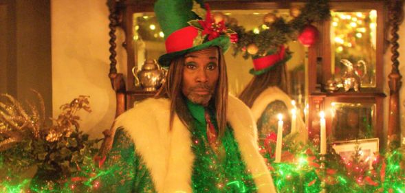 Billy Porter in green and white as the Ghost of Christmas Past in Christmas Karma
