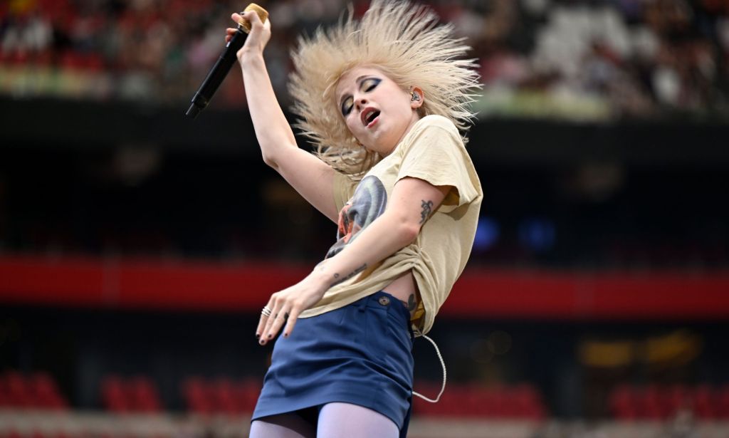 Hayley Williams flicking her hair during a show.
