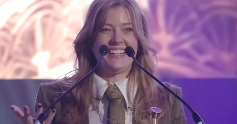 Jennifer English celebrating her win at the Golden Joystick Awards.