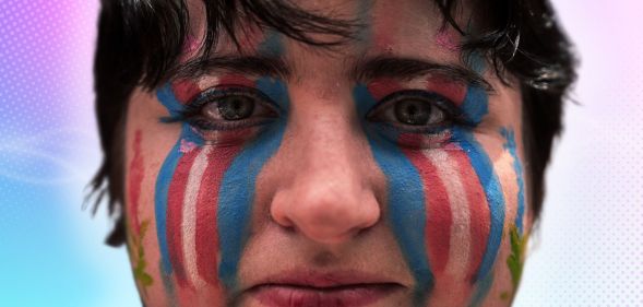 A person with trans make-up on their face.