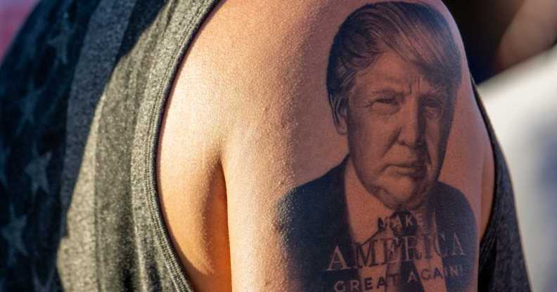 Donald Trump's portrait is seen tattooed on a persons arm.
