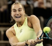 NEW YORK, NEW YORK - DECEMBER 08: Aryna Sabalenka in action against Naomi Osaka of Japan during the Garden Cup at Madison Square Garden on December 08, 2025 in New York City. (Photo by Adam Hunger/Getty Images)