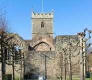 Ruins of St Peter's church bombed 1940 in Castle Park, city center of Bristol, England, UK.