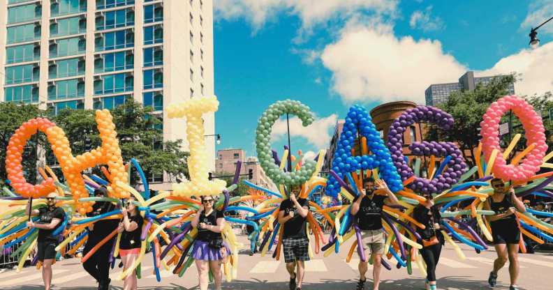 Participants carrying balloons spelling out "Chicago" during the 53rd annual Chicago Pride Parade on 30 June, 2024, in Chicago, Illinois.