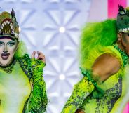 Drag Race UK season seven stars Catrin Feelings and Tayris Mongardi dressed as alligators during the season's Rusical challenge.