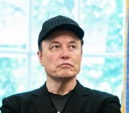 Elon Musk looks on during a news conference with US President Donald Trump in the Oval Office