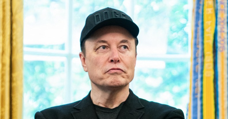 Elon Musk looks on during a news conference with US President Donald Trump in the Oval Office