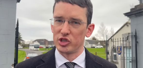 Enoch Burke stood outside Wilson's Hospital School.