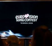 A screen shows the logo of the Eurovision Song Contest (ESC) 2026