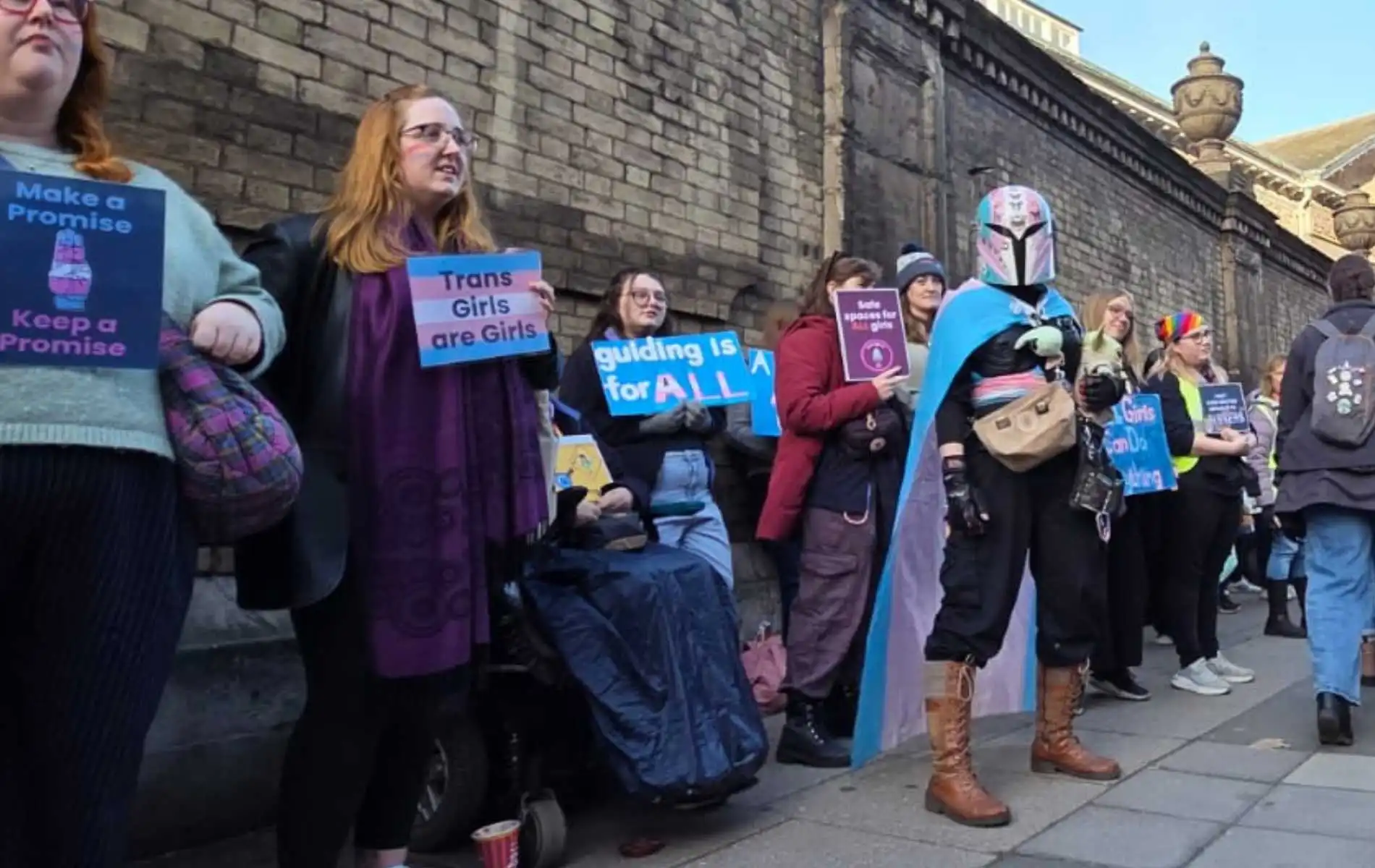 Hundreds gather outside Girlguiding HQ to demand trans ban is reversed: 'Adults debate, children bleed'