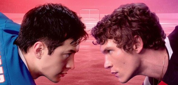 Heated Rivalry Hudson Williams as Shane Hollander and Connor Storrie as Ilya Rozanov facing off on the ice.