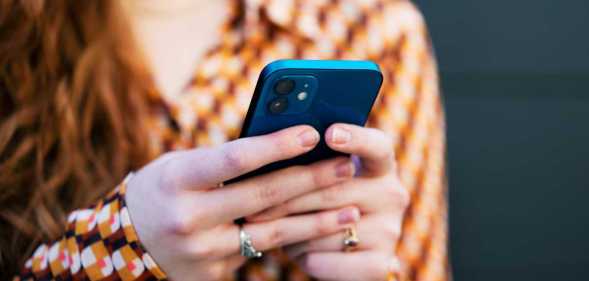 Close up of woman using smart phone