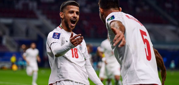 DOHA, QATAR - JANUARY 19: M. Ghayedi #18 of Iran celebrates scoring his team's first goal during the AFC Asian Cup Qatar 2023 second round Group C match between Hong Kong and Iran at Khalifa International Stadium on January 19, 2024 in Doha, Qatar. (Photo by Gao Meng/VCG via Getty Images)