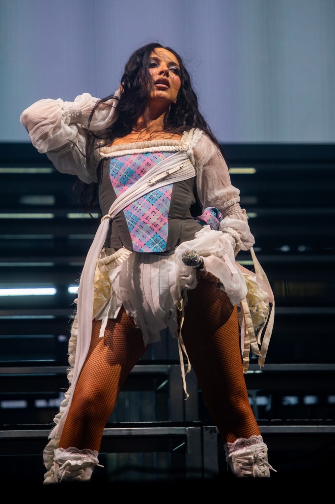 JADE made her solo debut in trans flag colours. Jade on stage in a pink, blue and white corset.