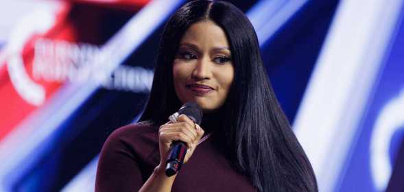 Surprise guest Nicki Minaj is interviewed by Erika Kirk on the final day of Turning Point USA's annual AmericaFest conference.