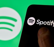 Close-up images show the Spotify logo and mobile application interface on a smartphone screen.