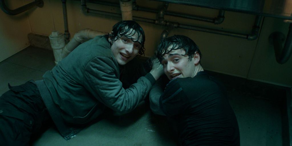 Finn Wolfhard and Noah Schnapp on a bathroom floor in Stranger Things season five.