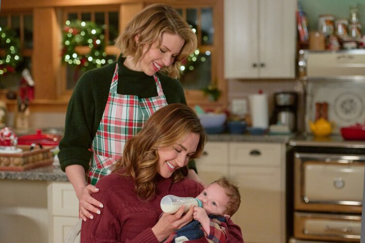 The Christmas Baby still: two women looking after a baby