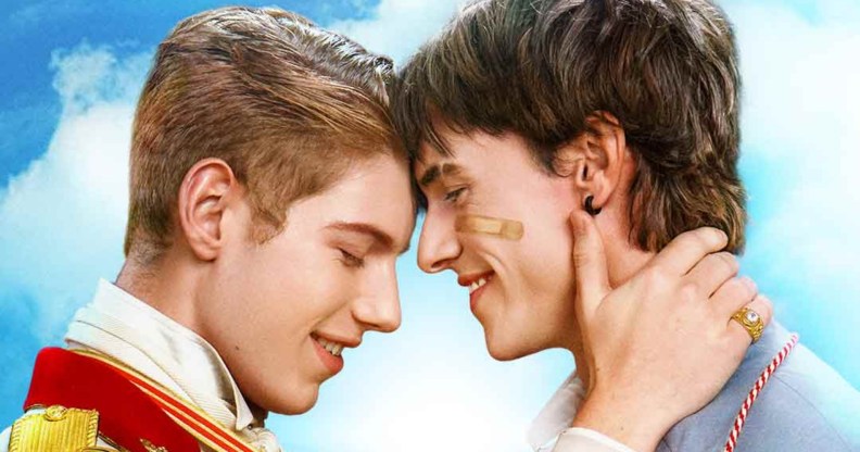 Andrew Tong as Prince Nicholas Valehart and Greg Duffy as his lover, Lucas Wilder. THe pair are resting their foreheads together while Nicholas has his hand on Lucas' neck.