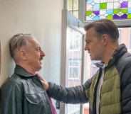 Tip Toe still: Alan Cumming as Leo being pinned against the wall by David Morrissey as Clive