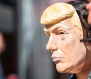 Atlanta, GA, USA - October 21, 2017: A person wears a Donald Trump mask at the Little Five Points Halloween Parade on October 21, 2017 in Atlanta, GA.