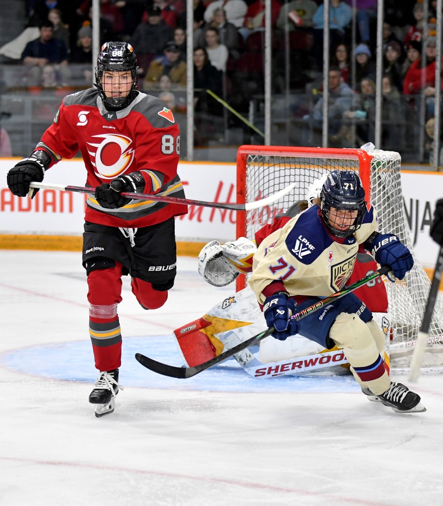 Ronja Savolainen #88 of the Ottawa Charge and Anna Kjellbin #71 of the Montreal Victoire skate during the third period of their PWHL game