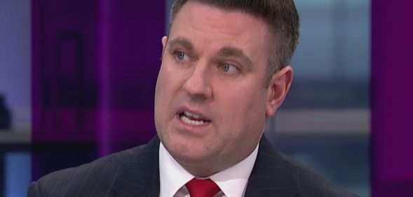 A portrait image of Charity Commission CEO David Holdsworth.