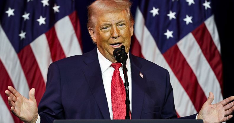 US president Donald Trump speaking at a podium.