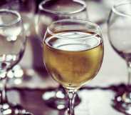 Several drunk glasses of wine and car keys next to them.