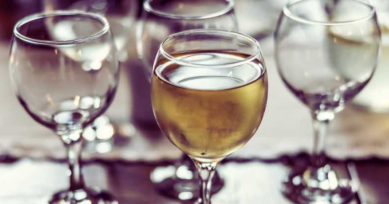 Several drunk glasses of wine and car keys next to them.