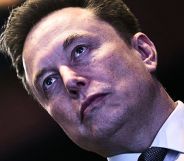 A tilted photo of Elon Musk.