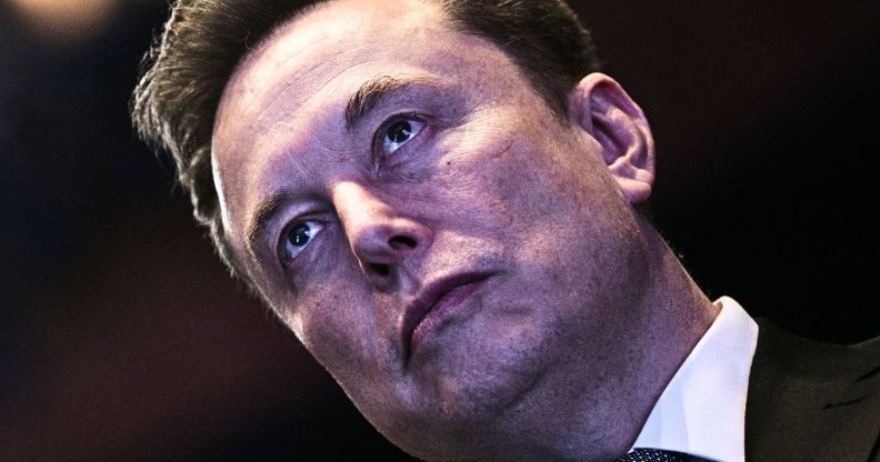 A tilted photo of Elon Musk.