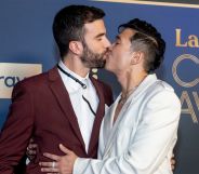 ohn-Michael Sudsina and Joel Kim Booster arrive at the Las Culturistas Culture Awards at The Orpheum Theatre on July 17, 2025 in Los Angeles, California.