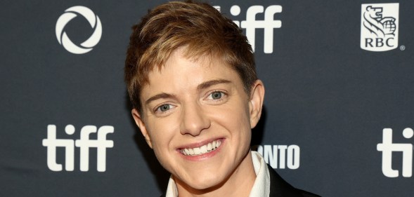 Comedian Mae Martin smiling at the camera